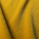 Tissu de velours jaune doux aux plis délicats et à la texture lisse et pelucheuse. Canape Paris by Atelier Bis