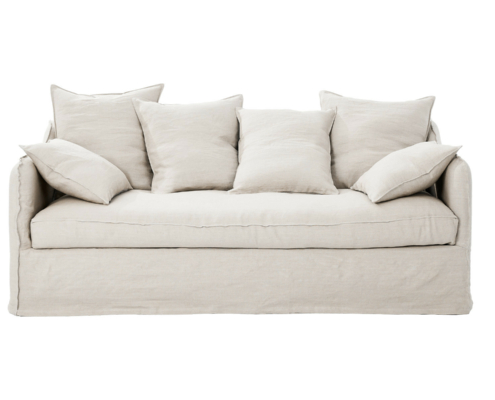 Canapé tapissé beige avec six coussins assortis sur fond blanc. Canape Paris by Atelier Bis