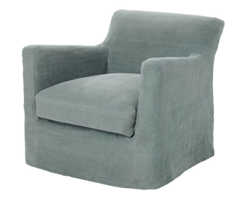 Fauteuil rembourré bleu clair avec une base en jupe, un coussin d'assise moelleux et des accoudoirs légèrement incurvés. Canape Paris by Atelier Bis