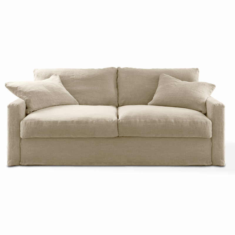 Canapé deux places beige avec deux coussins assortis, sur fond blanc. Canape Paris by Atelier Bis