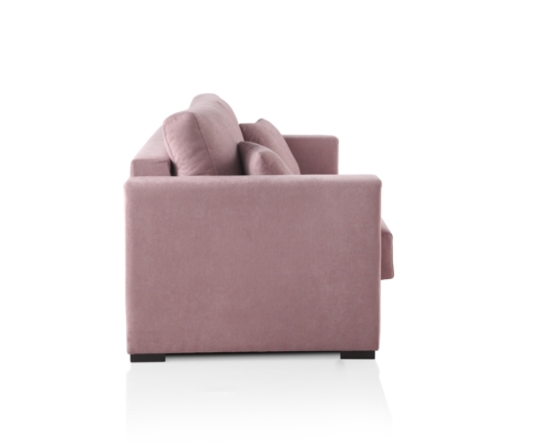 Vue latérale d'un canapé moderne rose convertible Homesprit Bidart avec coussins, sur fond blanc. Canape Paris by Atelier Bis