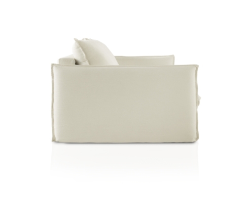 Vue latérale d'un fauteuil moderne à coussin blanc sur fond blanc uni, conçu pour compléter la collection GRENADE, convertible en canapé. Canape Paris by Atelier Bis