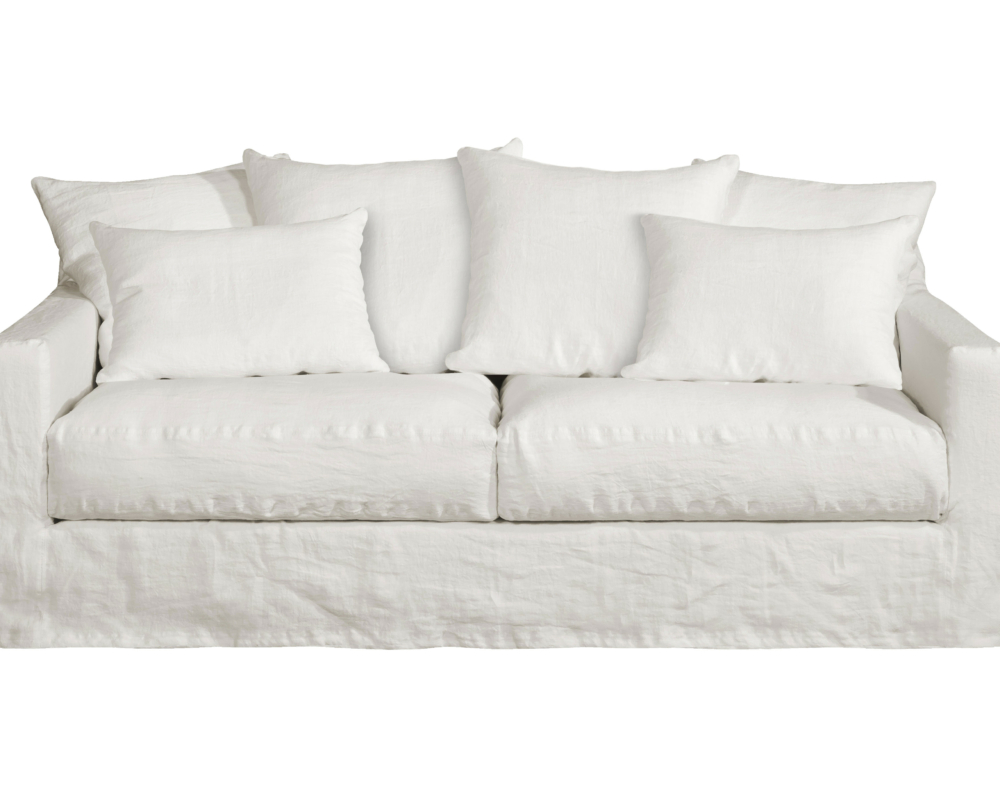 Canapé Homesprit Biscarrosse blanc, recouvert de lin, comprenant quatre grands coussins de dossier et deux coussins d'assise, entièrement déhoussables pour un entretien facile. Canape Paris by Atelier Bis